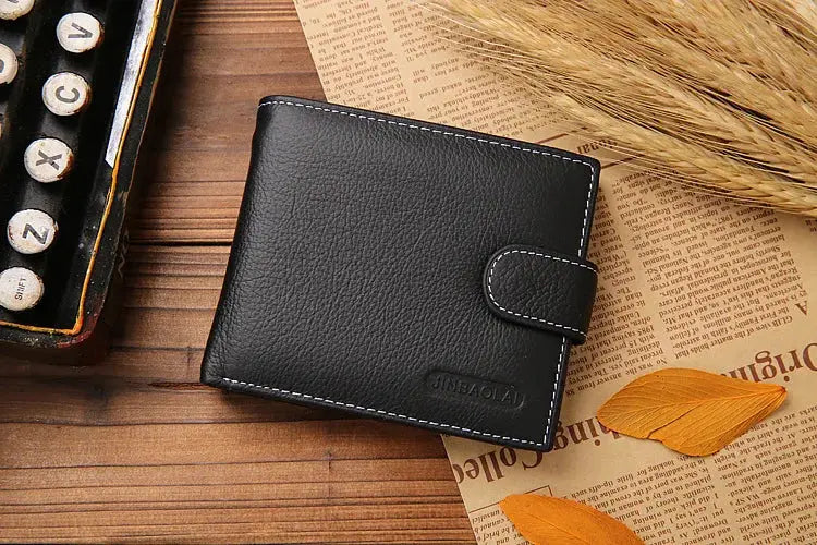 Simples Market black genuine leather men's wallet with strap closure and white stitching