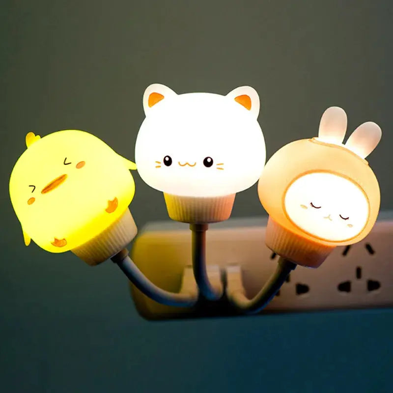 USB night light trio featuring a yellow chick, white cat, and beige bunny for kids' bedside lamp
