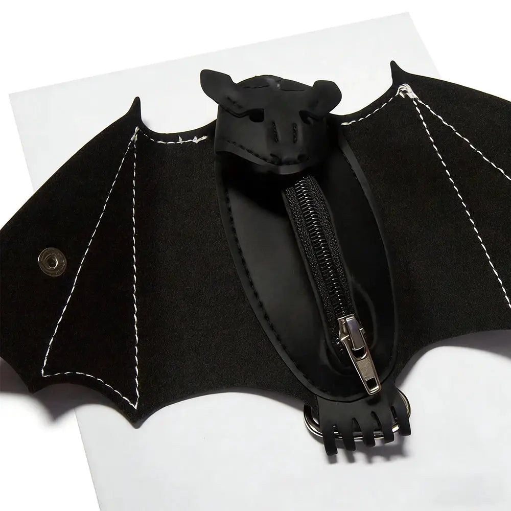 Bat-shaped coin purse in black PU leather with foldable wings and keychain ring