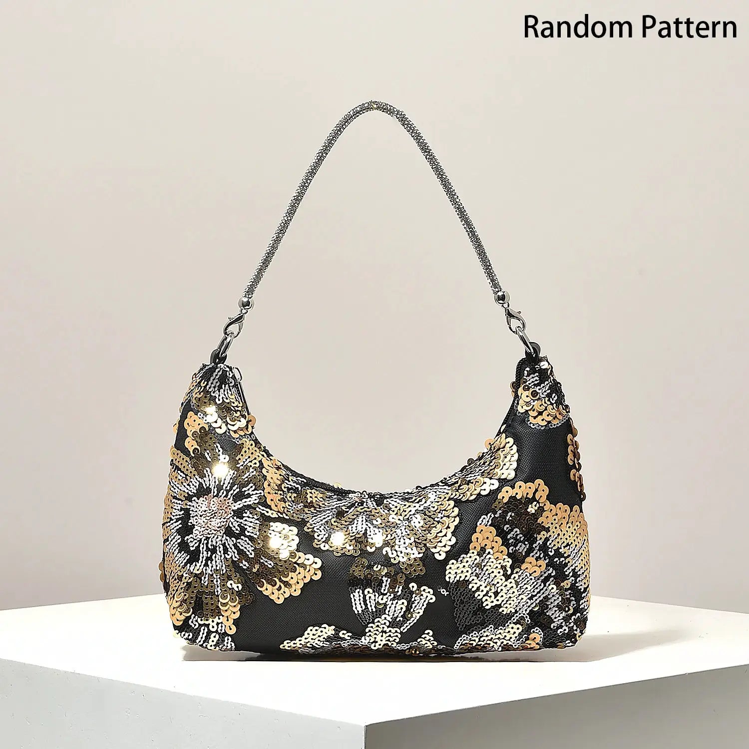 Shoulder bag by Simples Market with black fabric and gold-silver sequin floral embroidery; chain strap