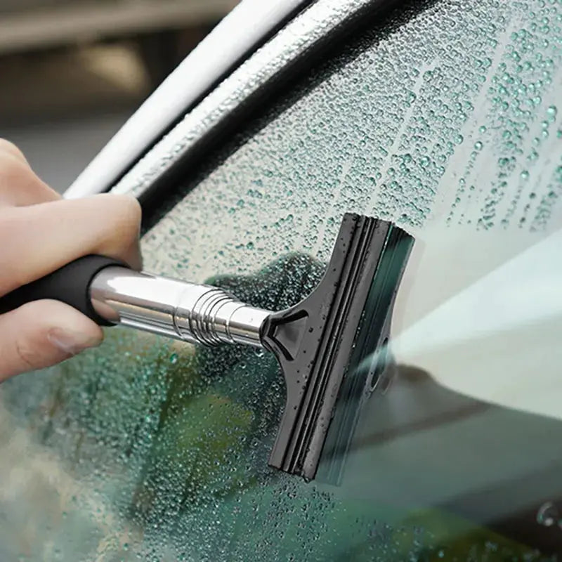 Car window cleaning tool with telescopic metal handle and black rubber squeegee blade