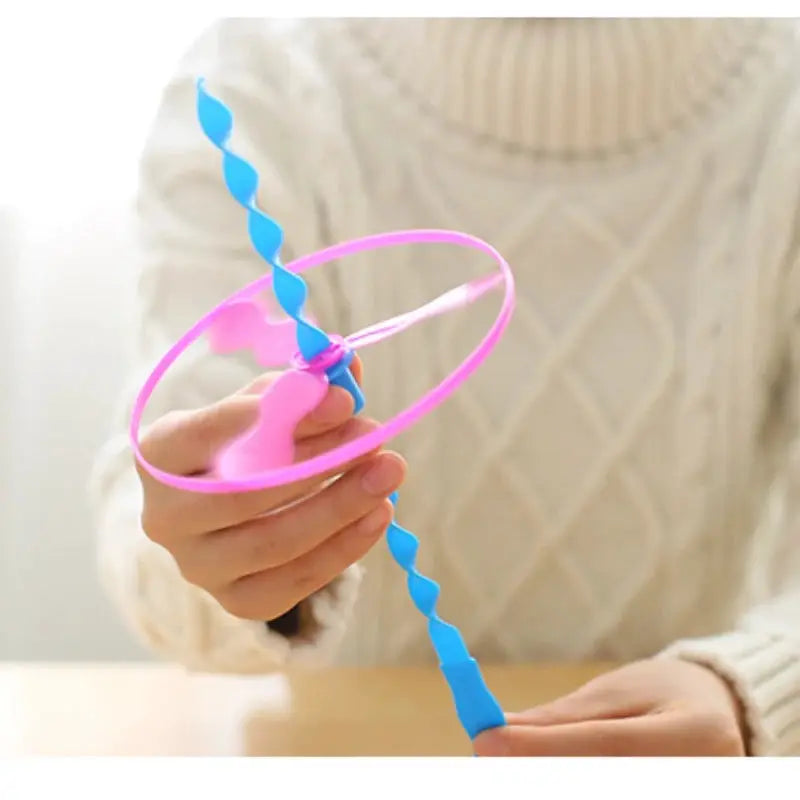 Twenty Piece Colorful Bamboo Dragonfly Plastic Hand Push Flying Toys For Kids Party Favors And School Goodie Bags