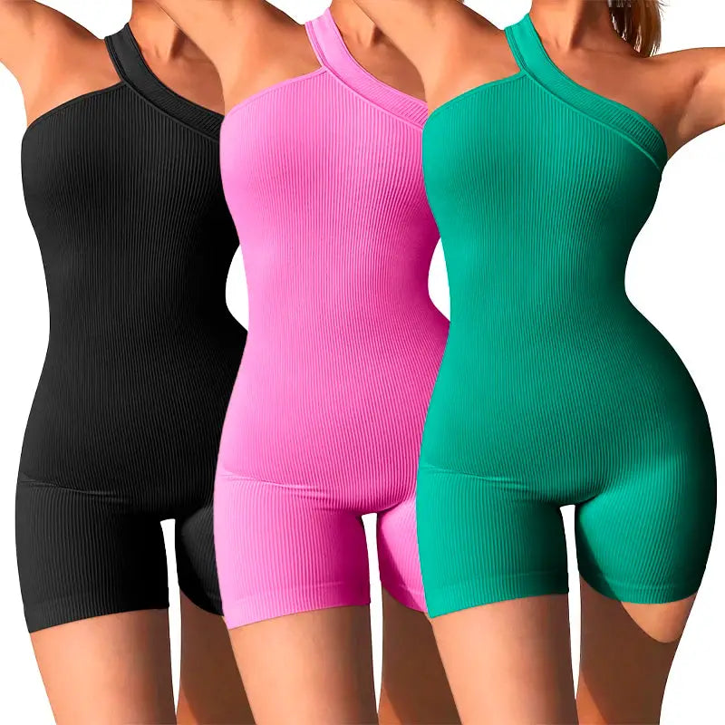 Three ribbed one-shoulder yoga rompers in black, pink, and green; tummy-control seamless one-piece jumpsuits.