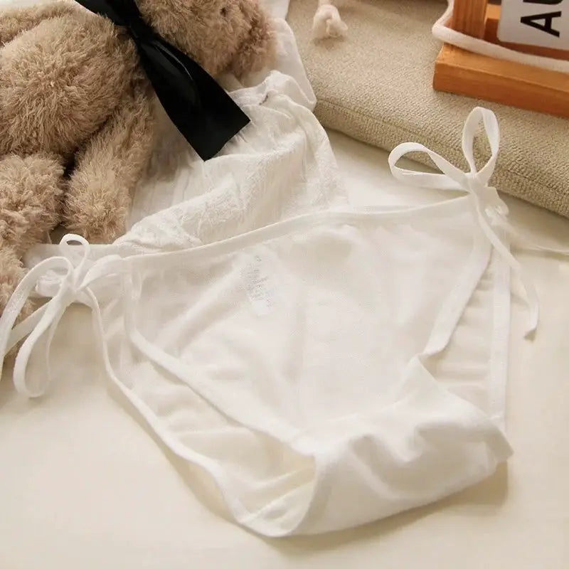 White lace-up briefs with side bows, low-rise women's underwear