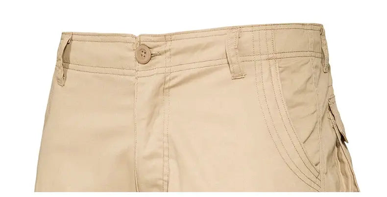 Men's beige cotton cargo shorts with multiple pockets, relaxed fit for outdoor casual wear.