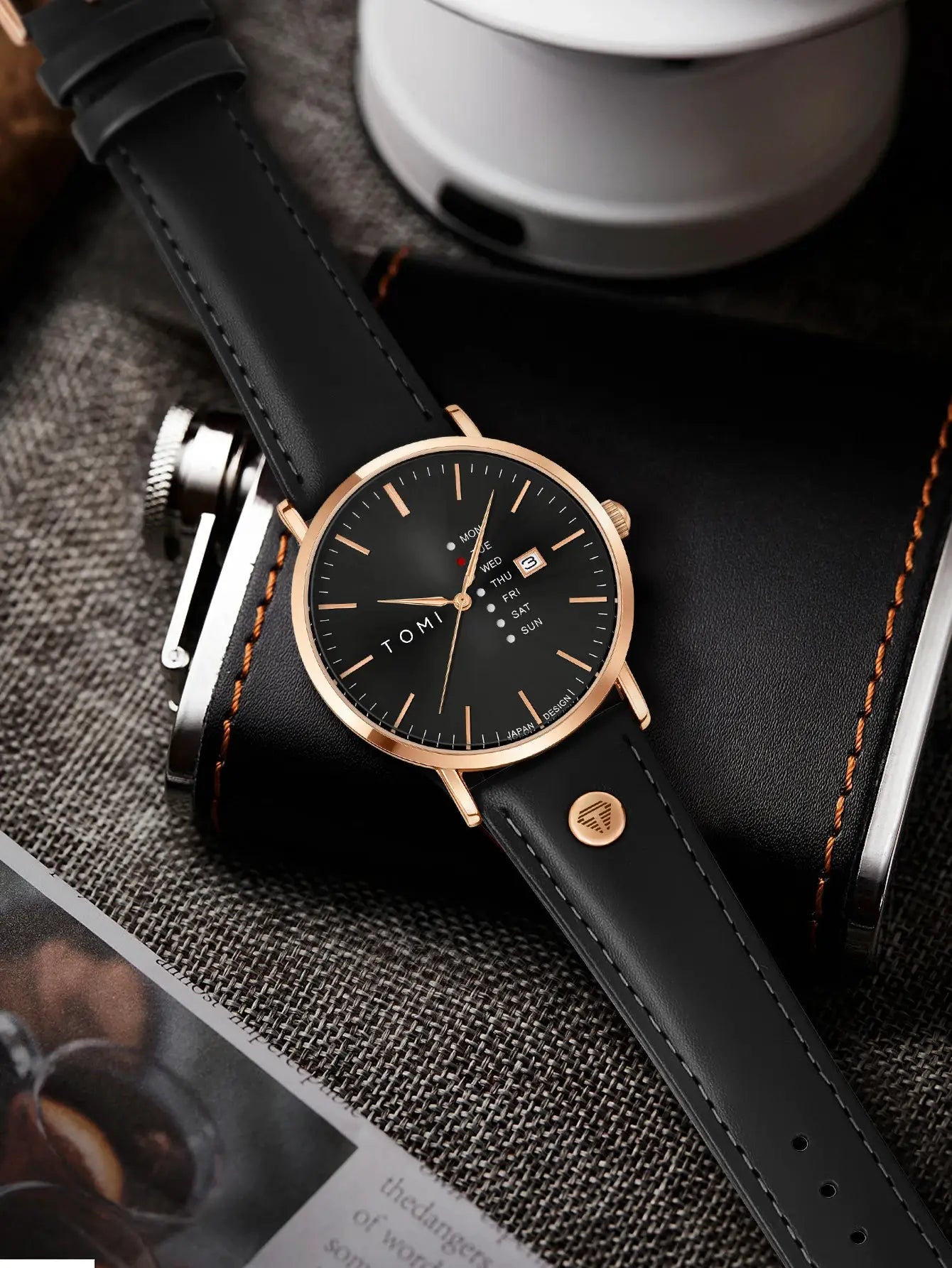 TOMI Trendy men's watch, black dial with rose-gold case, black leather strap, weekday calendar.