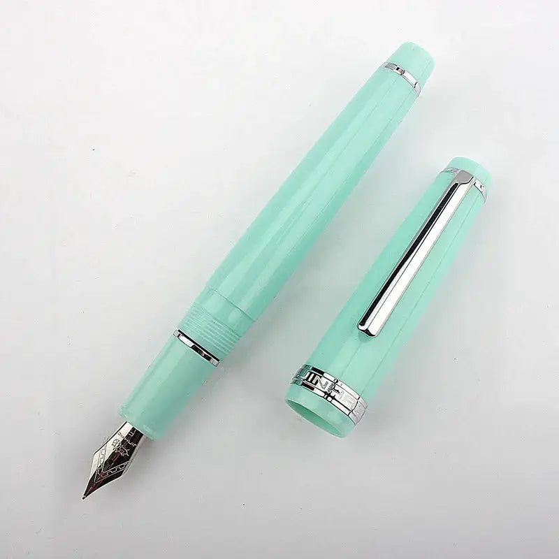 Jinhao 82 mint green acrylic fountain pen with silver trim and converter