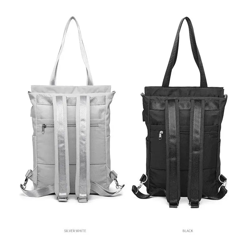 Two women's Oxford canvas waterproof laptop backpacks in silver/white and black with USB pockets