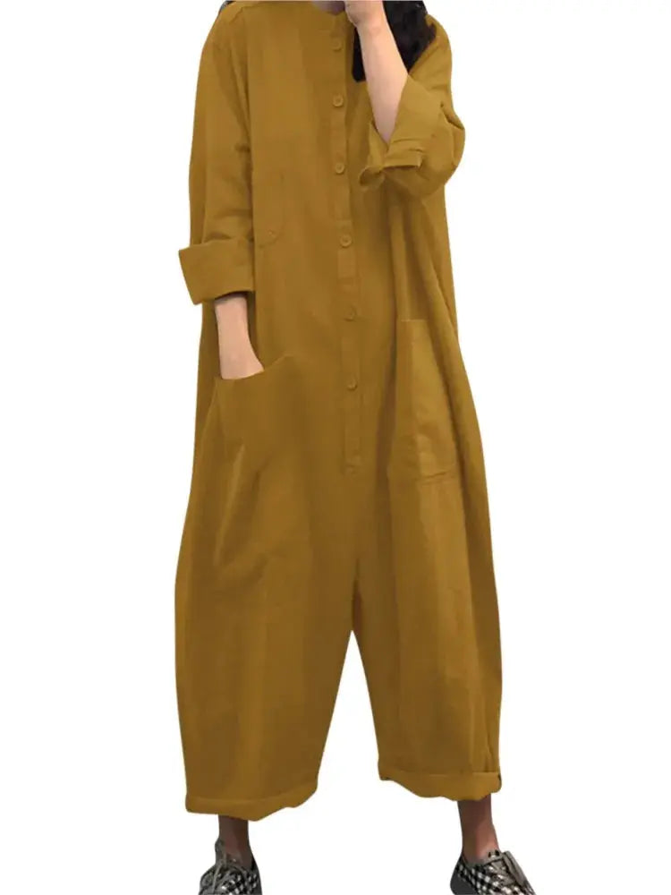 Simples Market mustard-yellow front-buttoned loose-pocket jumpsuit for women with long sleeves and wide legs.