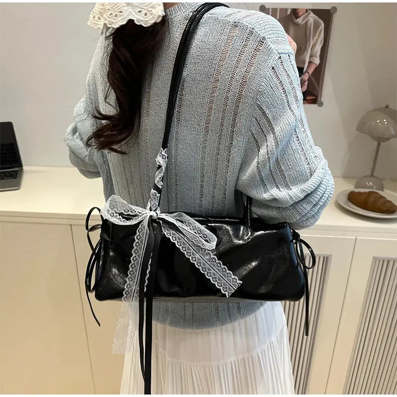 French Elegant Square Bag by Simples Market, black PU shoulder bag with white lace bow on the strap.