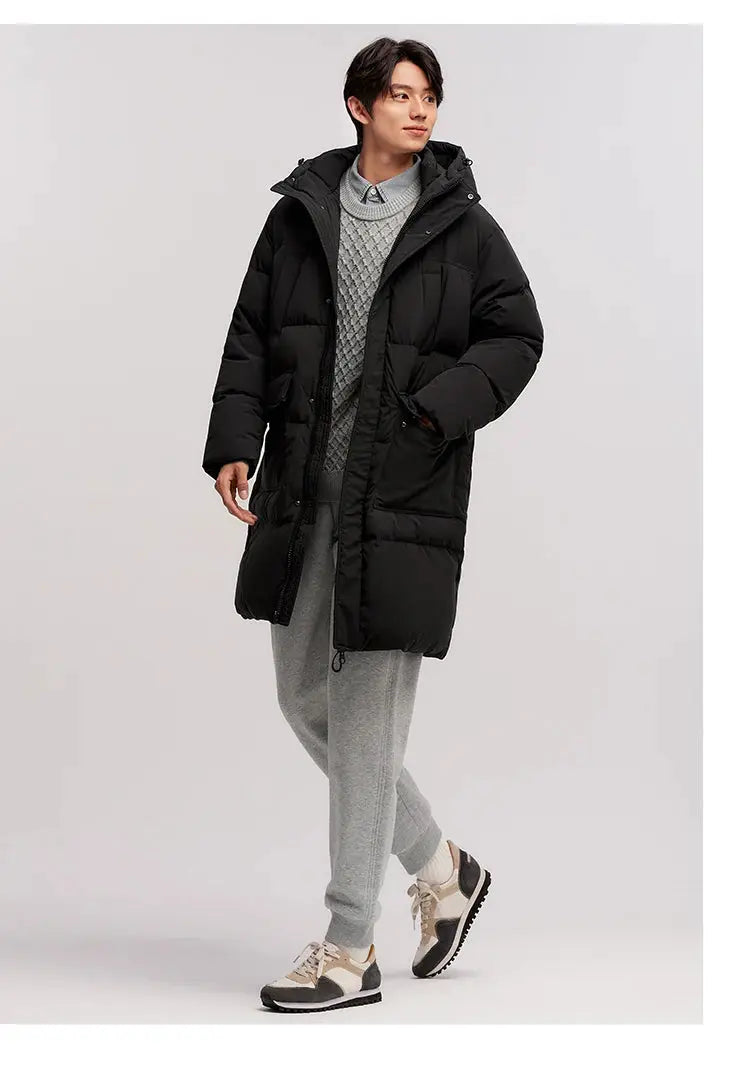Simples Market men's black long down jacket, quilted puffer with hood, paired with gray knit sweater and sweatpants.