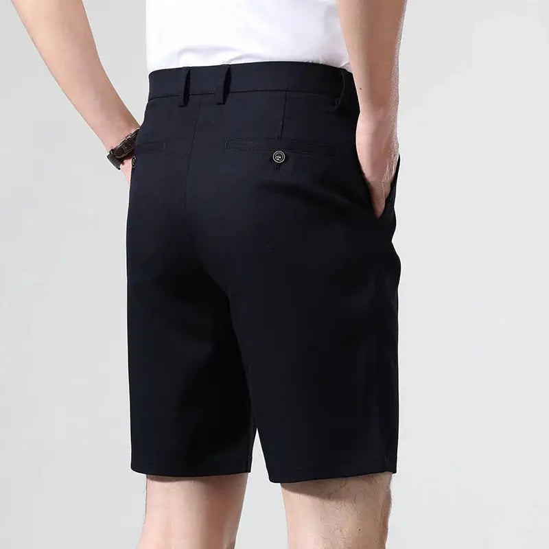 New Classic Fit men's stretch Bermuda shorts in black with rear buttoned welt pocket