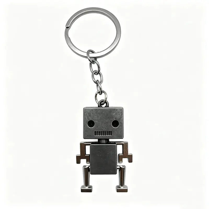 Retro movable robot keychain in vintage silver metal with square head and movable arms and legs.