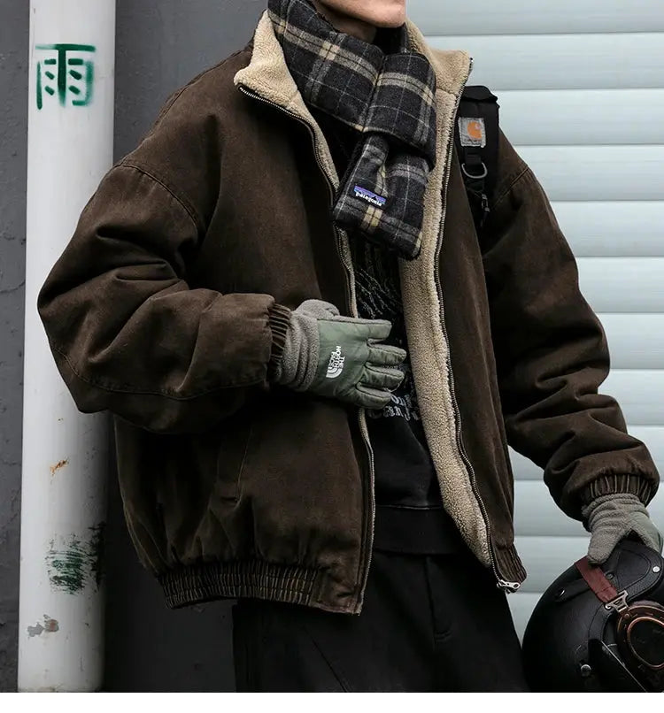 Men's brown polar fleece jacket with cream shearling lining, paired with plaid scarf