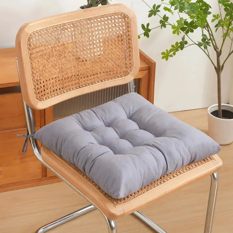 LMETJMA chair cushions by Simples Market on a wooden chair with a caned back; gray tufted pad with ties