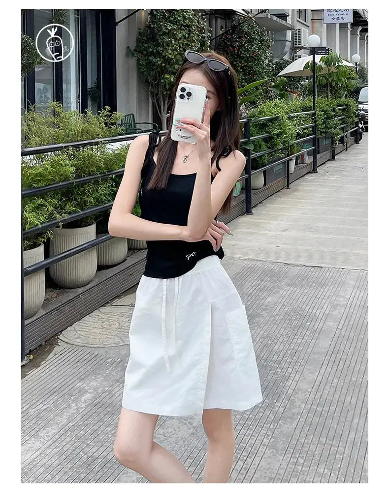 White high-waist fake two-piece shorts-skirt; lightweight A-line mini with side slit, Simples Market