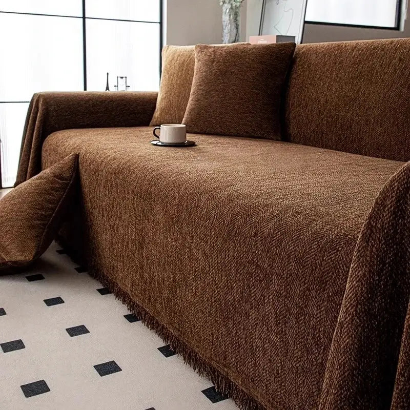 Chenille sofa cover with tassel edge in brown by Simples Market