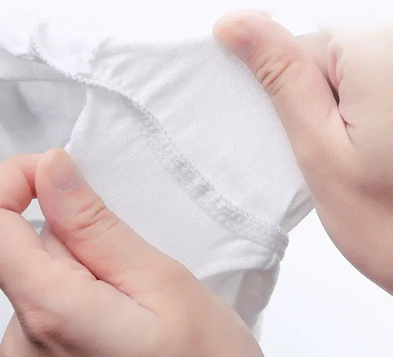 Disposable maternity panties in white fabric with elastic waistband seam.