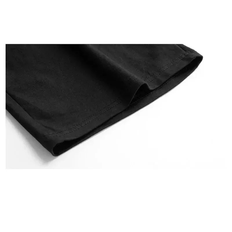 Men's black knee-length sport shorts for boxing and gym training.