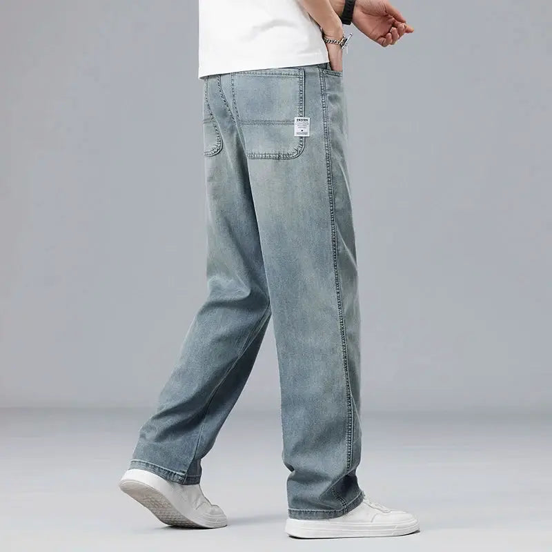 Men's ultra-thin Lyocell jeans in light blue, loose straight fit with back pocket tag