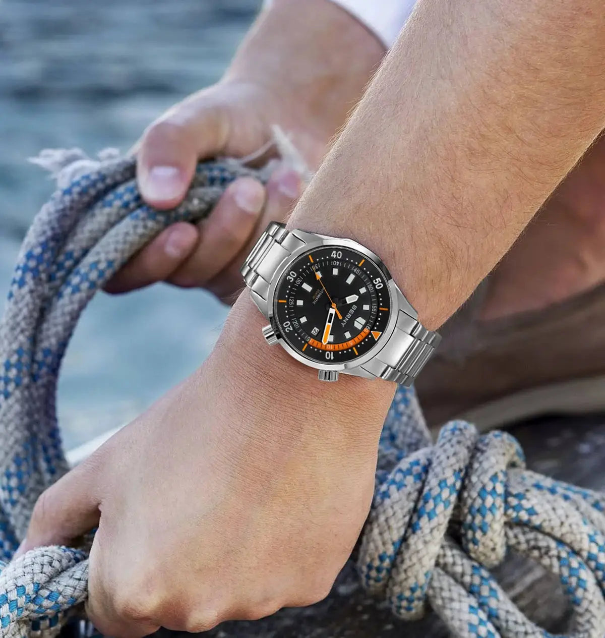 BERNY men's dive watch on stainless steel bracelet, black dial with orange accents, 200M water resistant