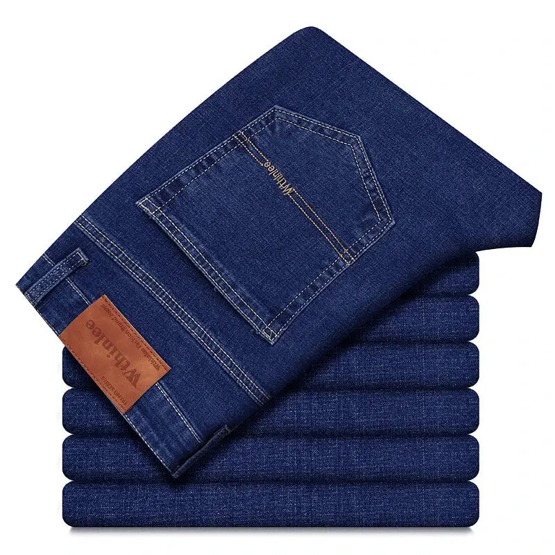 Men's blue denim jeans stack with back pocket, straight stretch fit