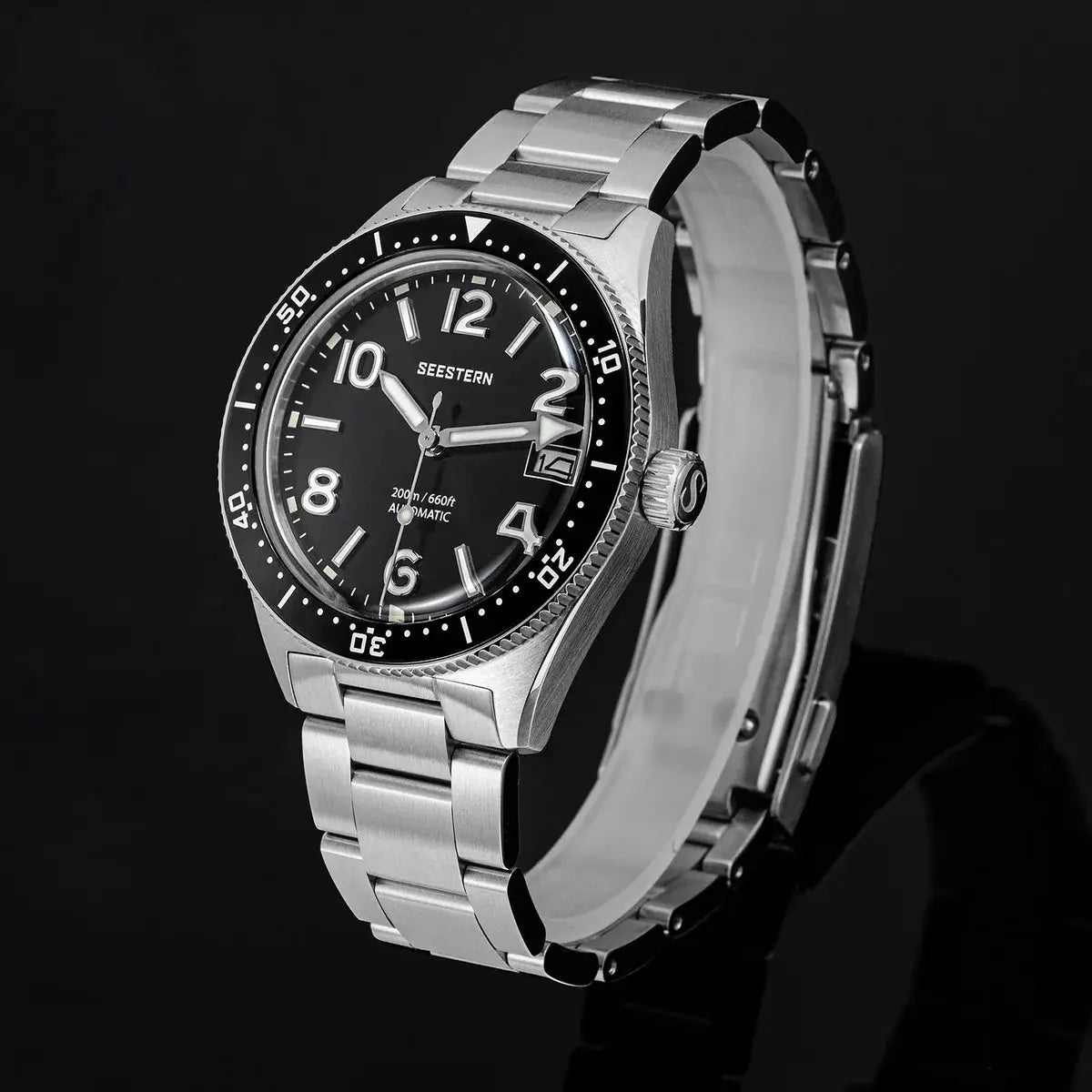 Seestern diver watch with stainless steel bracelet, black dial, luminous hands, automatic 200m water resistant.