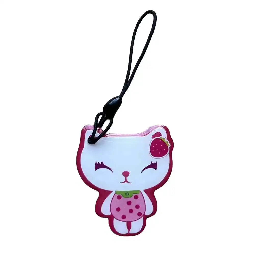 Simples Market cat-shaped RFID key fob, white with pink accents and a black strap