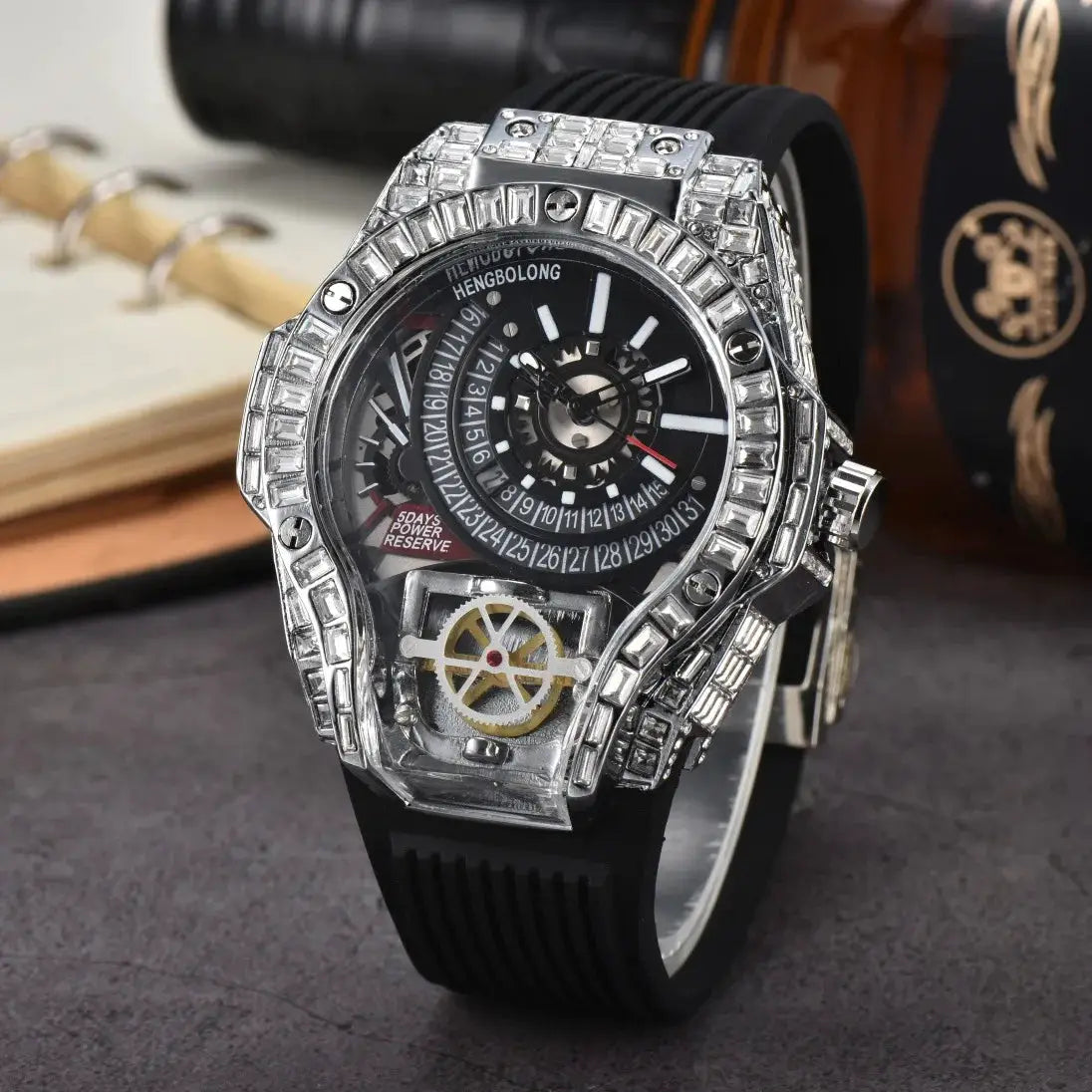 Full-diamond case luxury men's watch with black dial, visible gear window, crystal bezel, and rubber strap