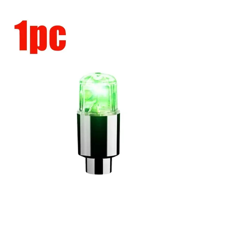 Car valve cap LED light by Simples Market, chrome base with green illumination