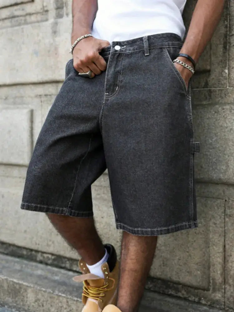 Men's denim shorts in black-grey, knee-length loose baggy fit.