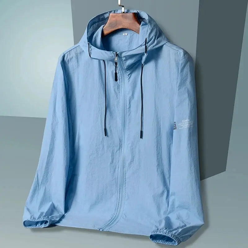 Light blue hooded windbreaker jacket with zip front, drawstrings, and elastic cuffs; UV sun protection