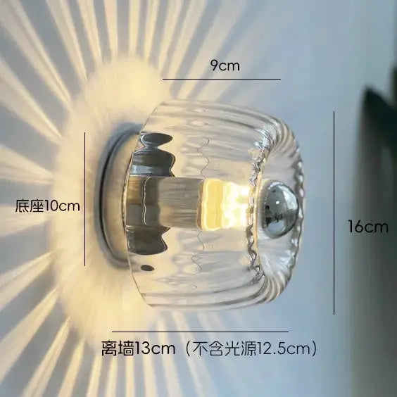 LED Bauhaus Glass Wall Lamp; ribbed clear glass wall sconce with warm glow, 16 cm tall, 9 cm wide, 13 cm from wall.