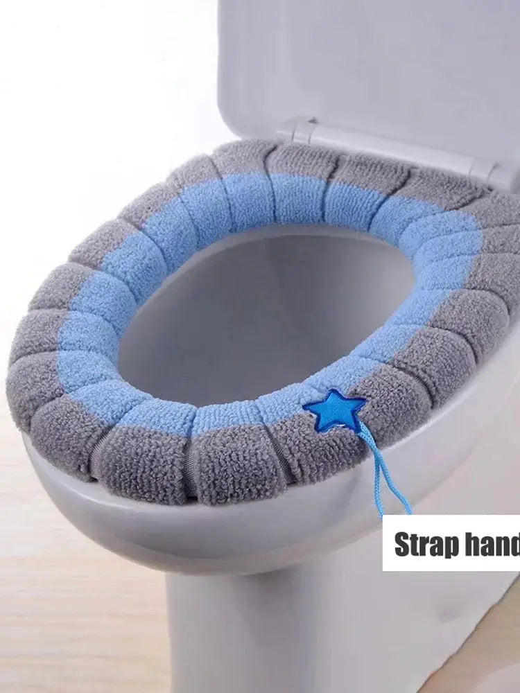 Toilet seat cover pad by Simples Market; plush, stretchable gray-blue ring cushion with blue star charm.