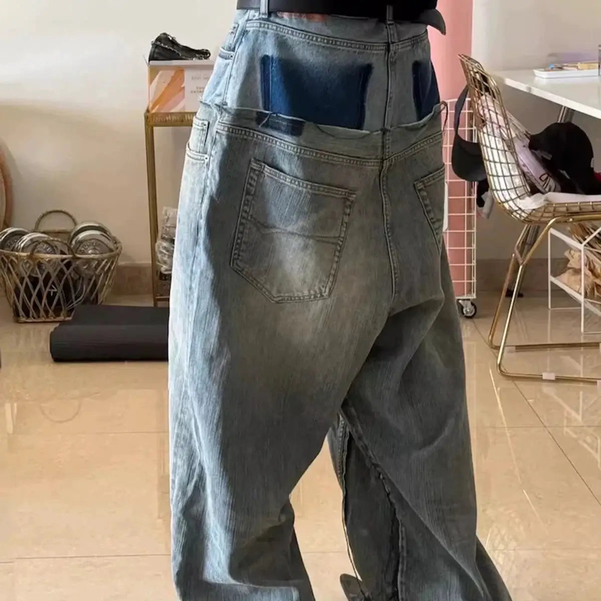 Baggy denim jeans by Simples Market; light-wash, double-layer patchwork, straight loose-fit with back pockets.
