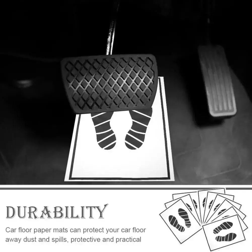 Disposable car floor mats on white sheets with footprint print; five sheets fanned, black textured anti-slip pad.