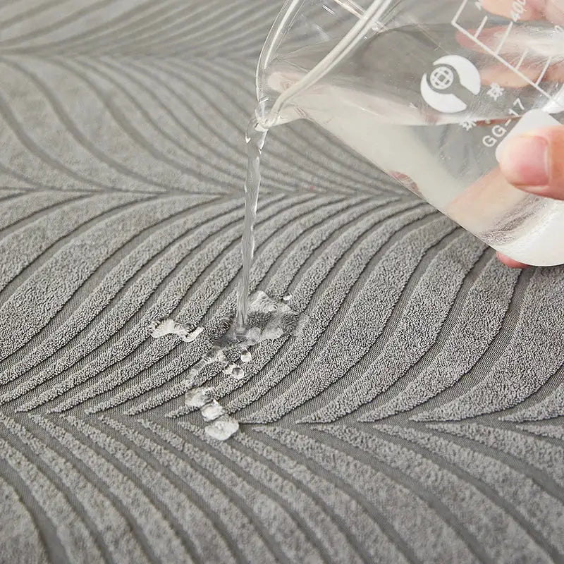 Splash-proof jacquard sofa cover, gray; Simples Market, high elasticity, anti-dirt and anti-scratch.