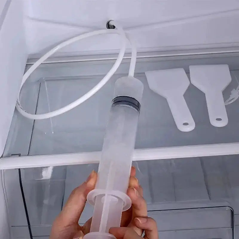 Simples Market refrigerator drain hole clog remover tool; translucent syringe-style plunger for cleaning