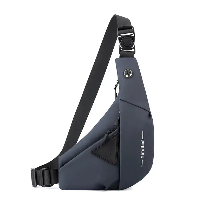 Sling chest bag by Simples Market in blue-gray with adjustable strap and front pocket.