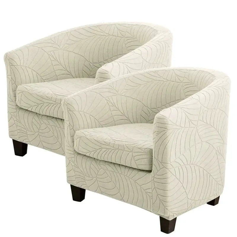 Two Simples Market Leaves Jacquard tub chairs in cream with leaf-pattern slipcovers; all-inclusive armchair set