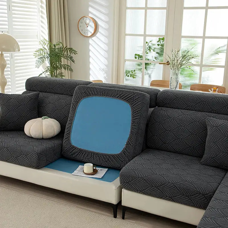Simples Market thick plush sofa cushion cover with elastic edges in dark gray geometric fabric and blue panel.