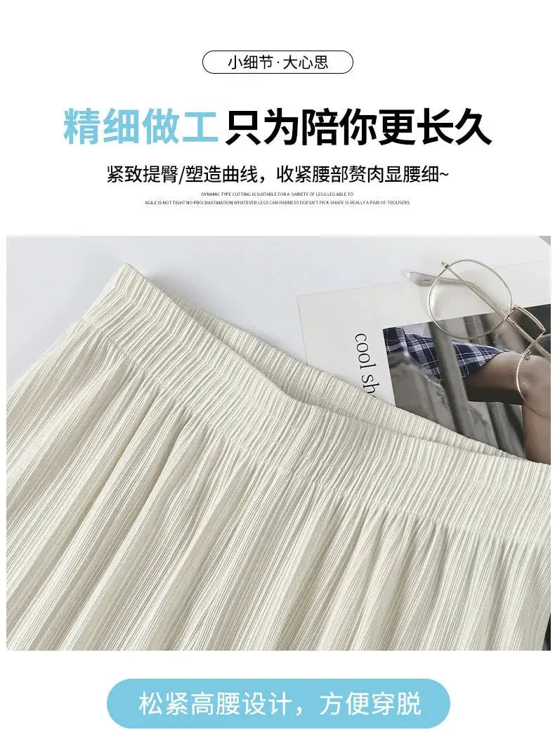 Wide-leg pants for women from Simples Market in cream ice-filament fabric with elastic waist