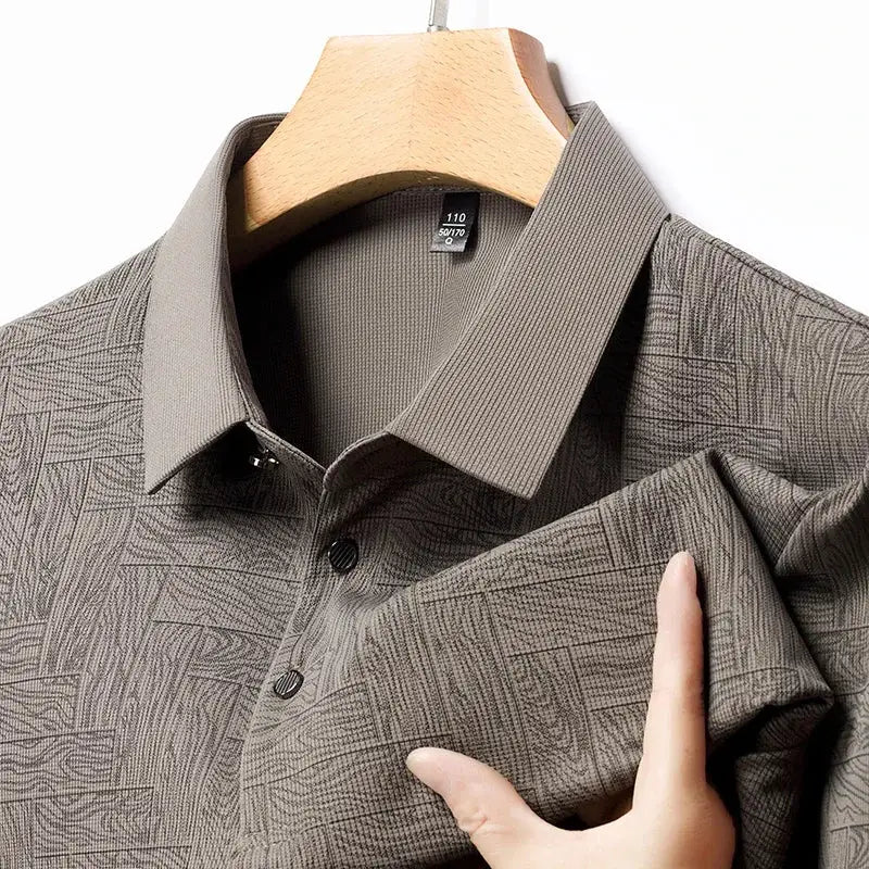 Men's grey geometric-print polo shirt, short-sleeve, classic-collar on hanger