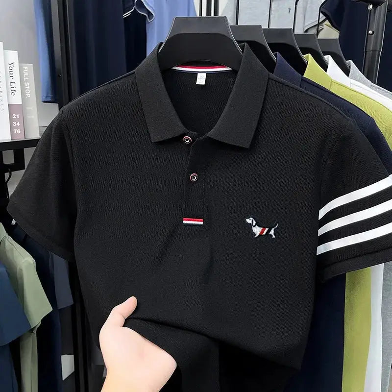 Men's black polo shirt by Simples Market with white striped sleeve cuffs and small puppy embroidery on chest.