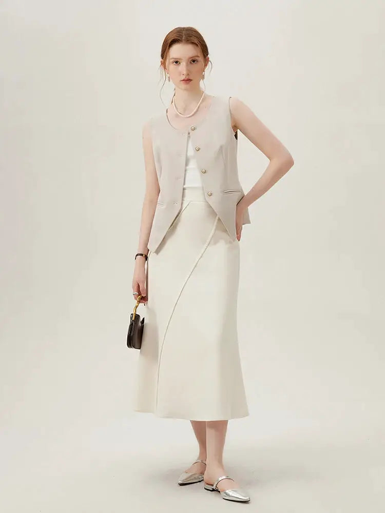 FSLE women blazer set by Simples Market in light beige with sleeveless blazer and matching midi skirt.