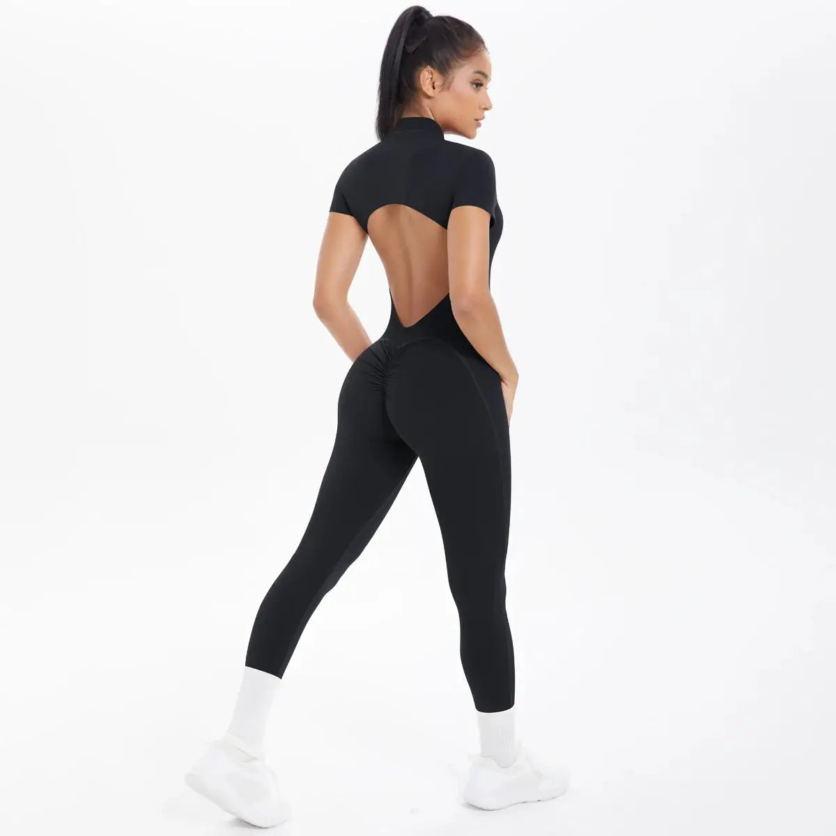 Women's black backless fitness jumpsuit, short sleeves, scrunch one-piece by Simples Market for gym/yoga