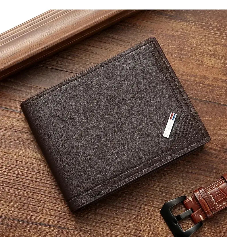 Men's leather short wallet by Simples Market, slim foldable dark brown leather with metal brand tag.