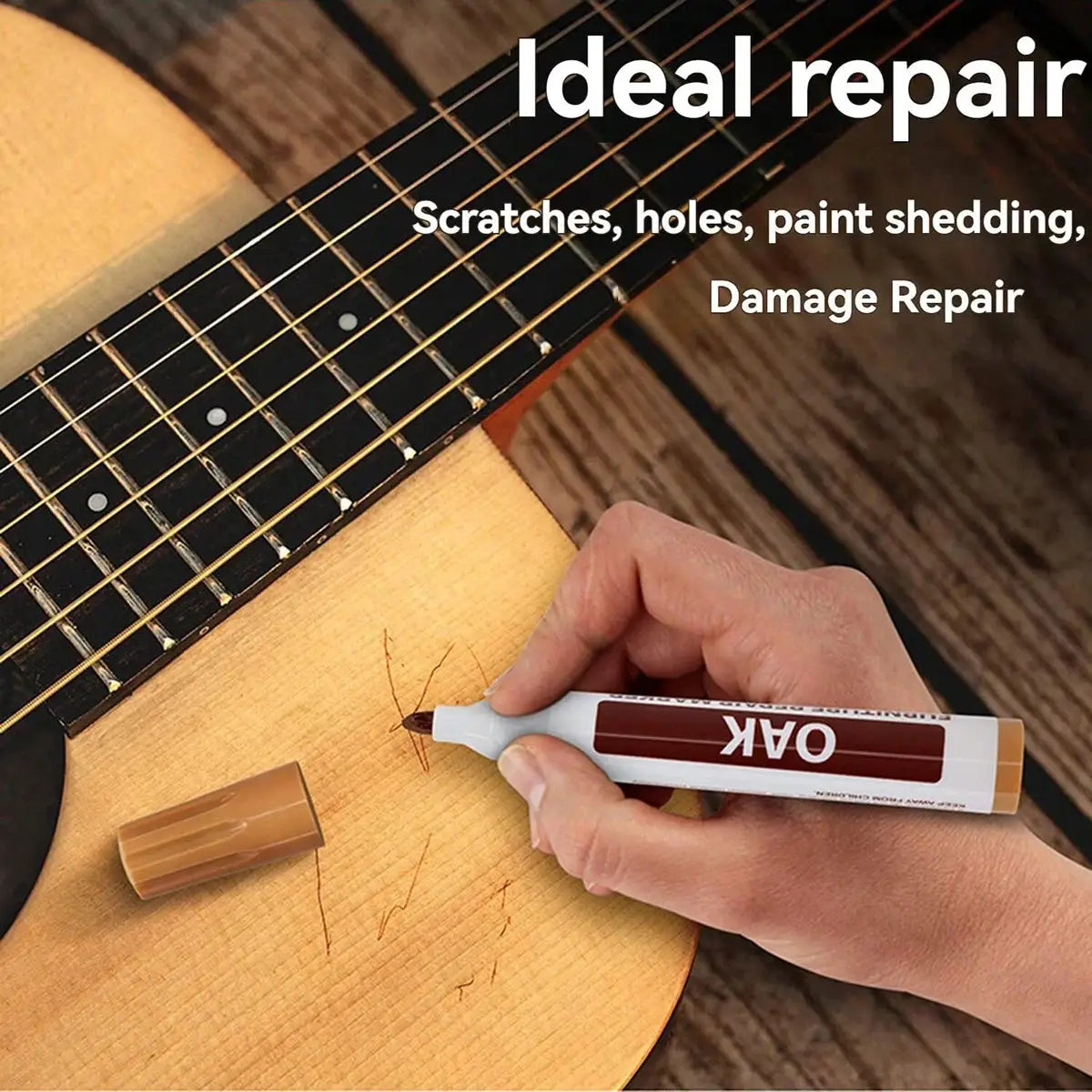 Furniture touch-up marker pen in brown used to repair scratches on a wooden guitar.