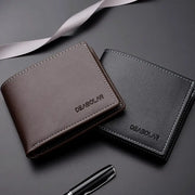 Two PU leather men’s short bifold cardholder wallets in brown and black with DEABOLAR branding