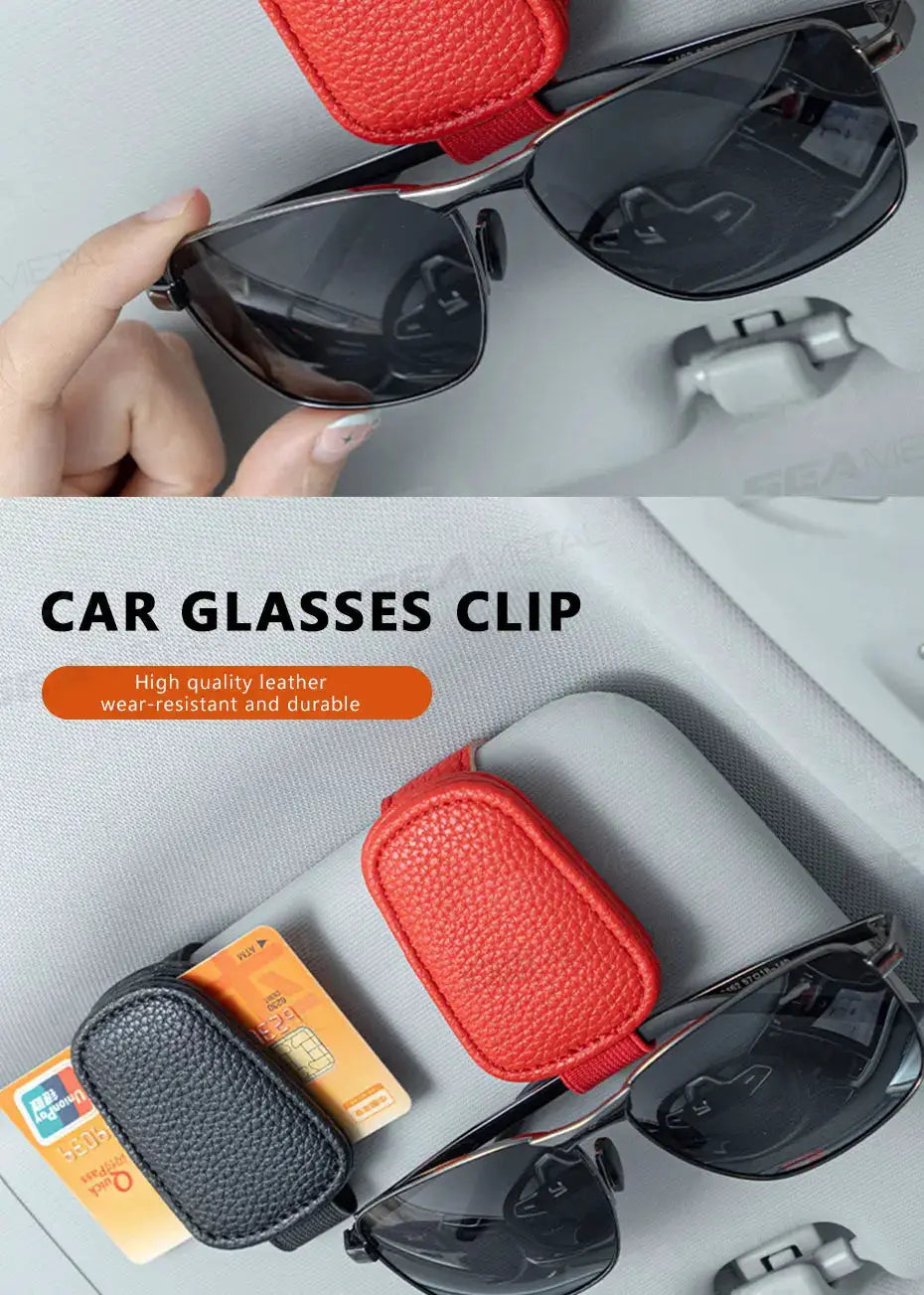 Car sun visor clip glasses holder with red and black PU leather cases on the visor